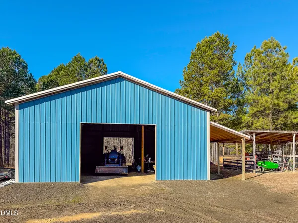 a view of swimming pool with seating space