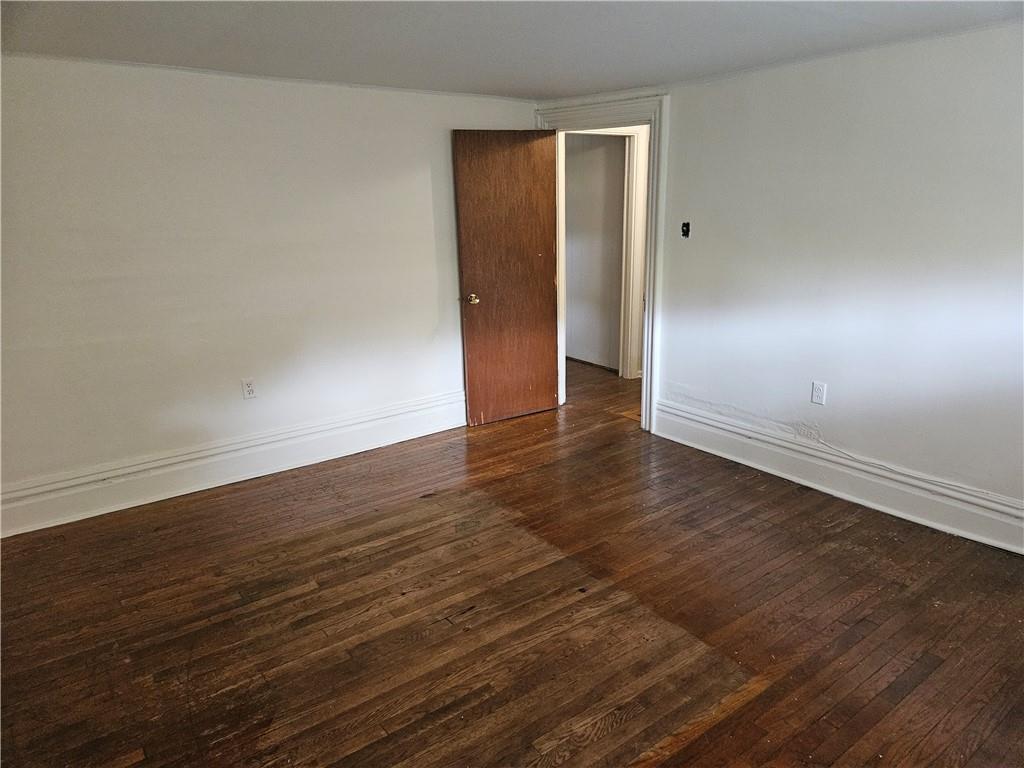 537 6th Street Braddock, PA 15104 - Photo 23 of 38 a view of an empty room with wooden floor