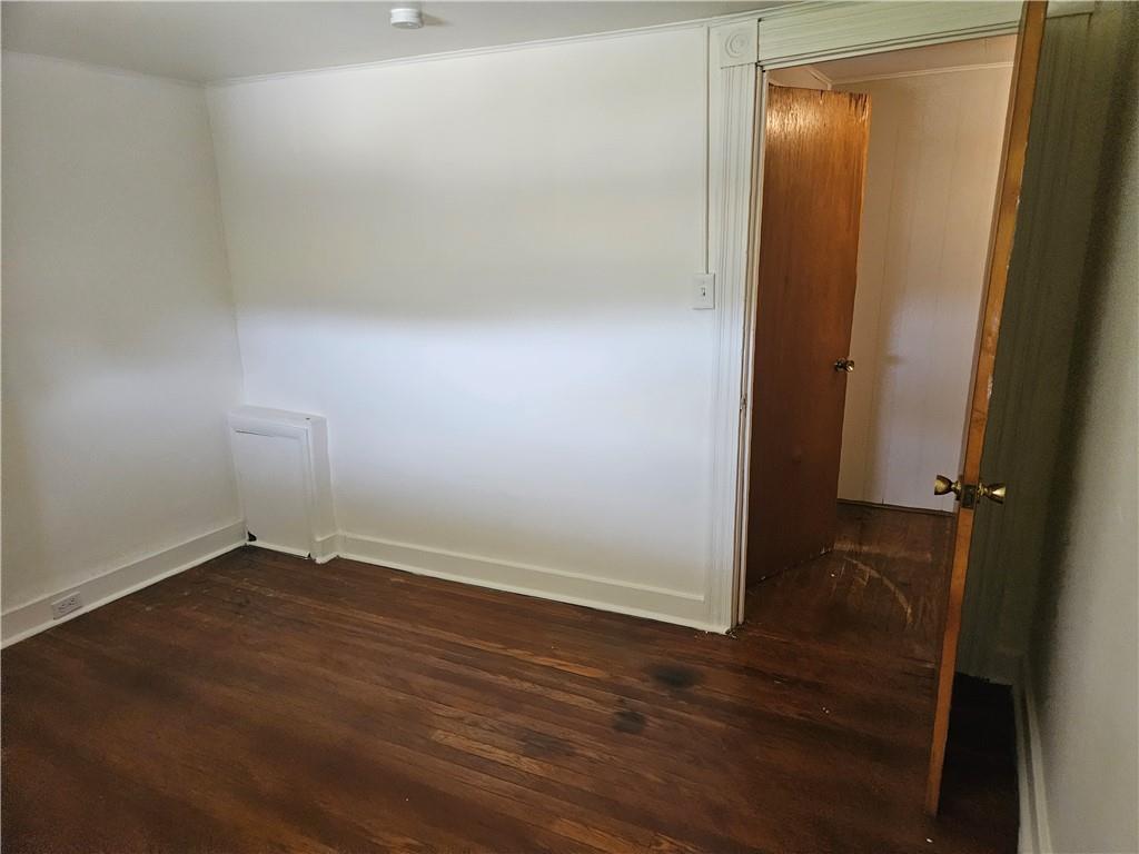 537 6th Street Braddock, PA 15104 - Photo 32 of 38 an empty room with wooden floor and closet