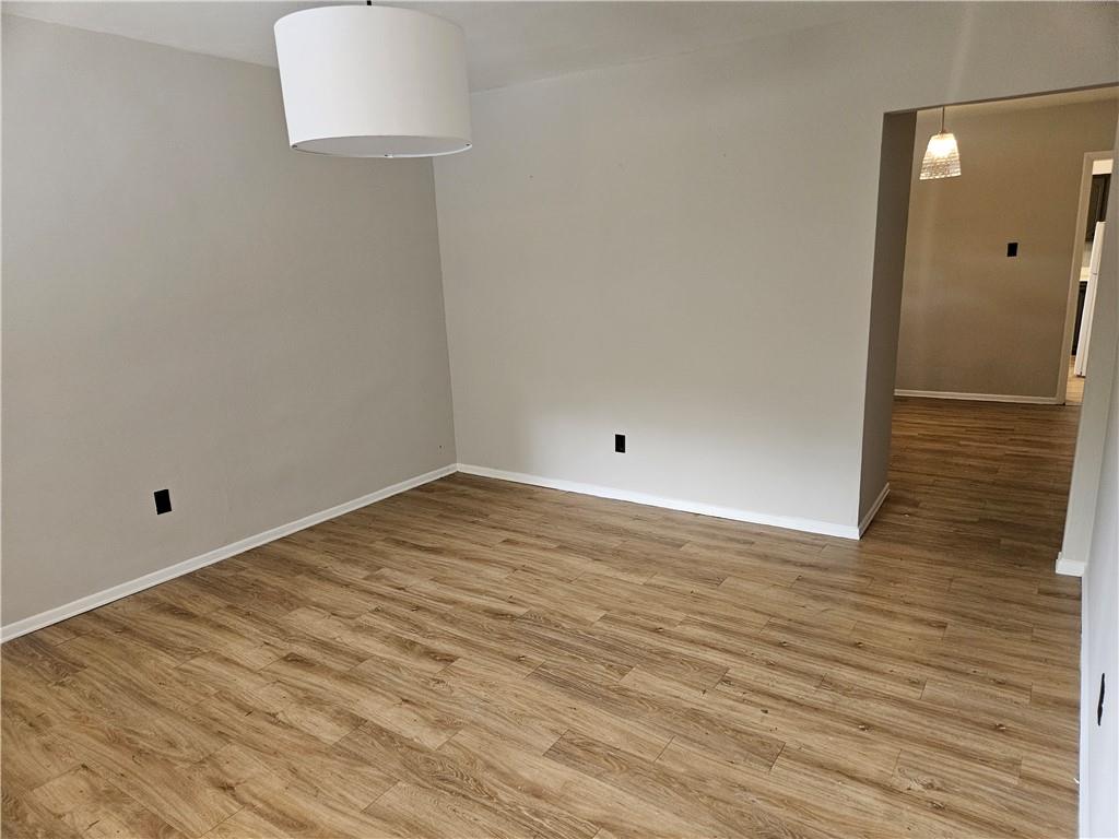 537 6th Street Braddock, PA 15104 - Photo 4 of 38 a view of empty room with wooden floor