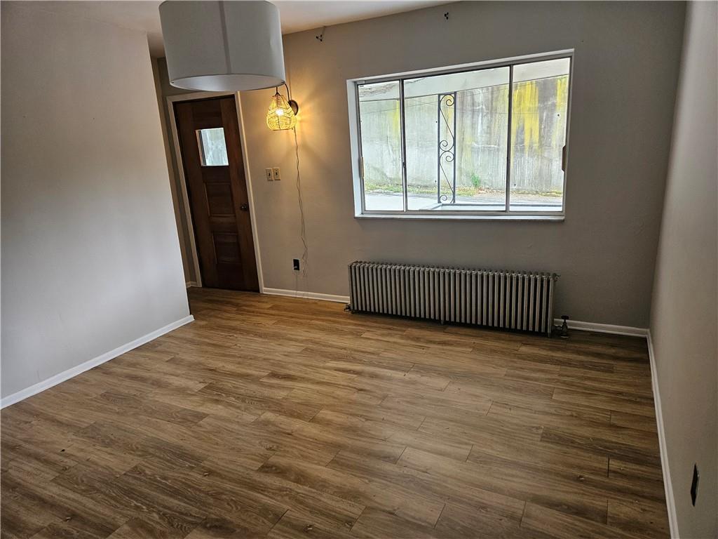 537 6th Street Braddock, PA 15104 - Photo 5 of 38 an empty room with windows