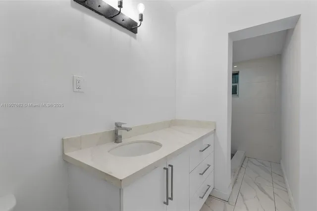 a bathroom with a sink and a vanity