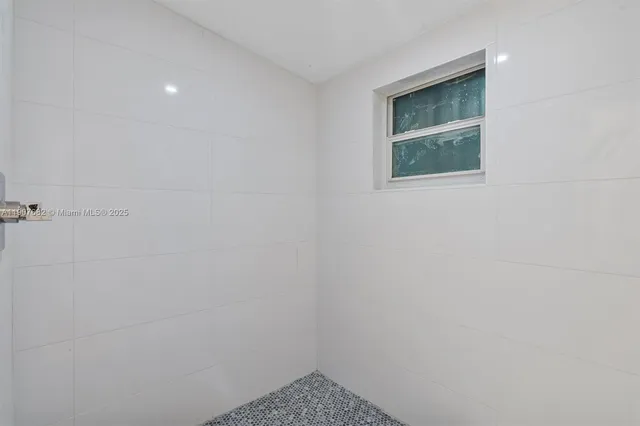 a bathroom with a window