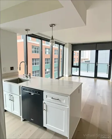 a kitchen with a stove and a sink