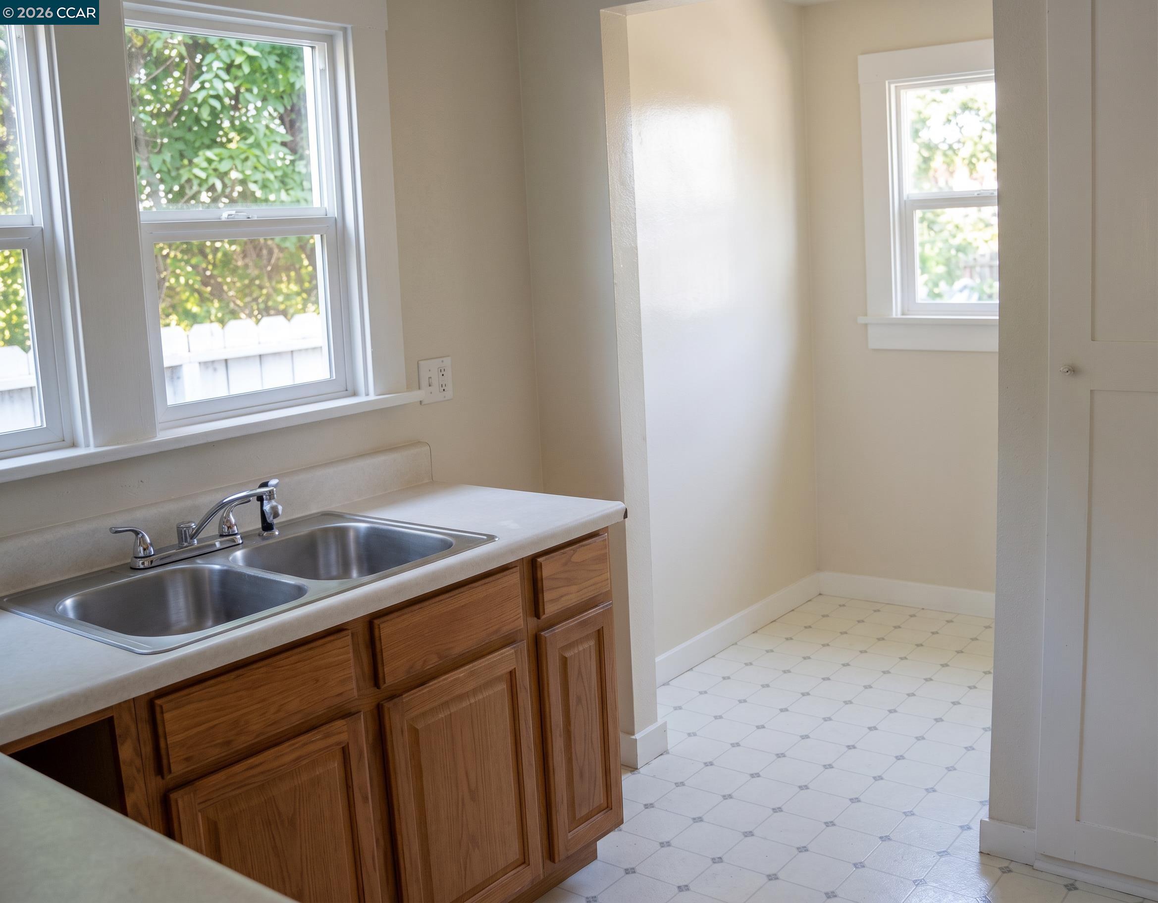 70 West Rose Bay Point, CA 94565 - Photo 3 of 8 a bathroom with a sink and a window