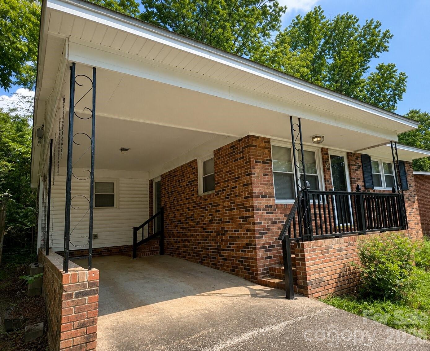 405 Isom Street Lancaster, SC 29720 - Photo 2 of 8 a view of back yard of the house