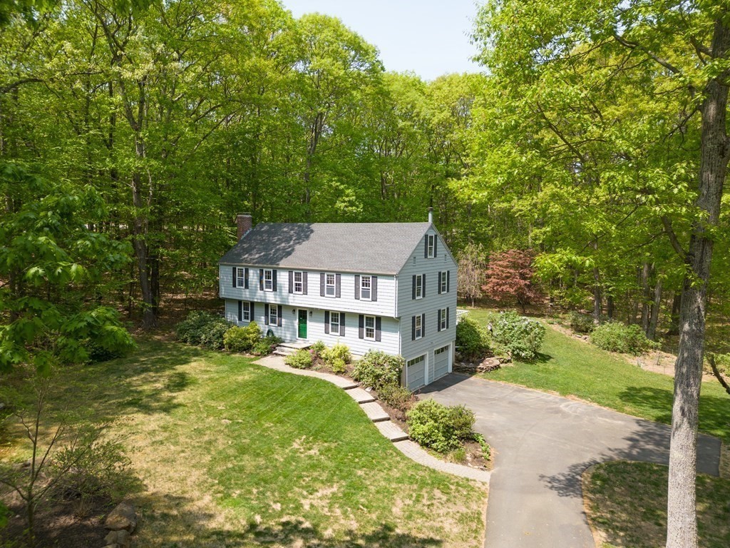 21 Adams Road Boxford, MA 01921 - Photo 38 of 40 a view of a big house with a big yard plants and large trees