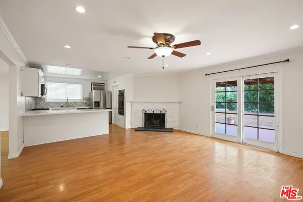 a view of a kitchen with a stove cabinets and a kitchen