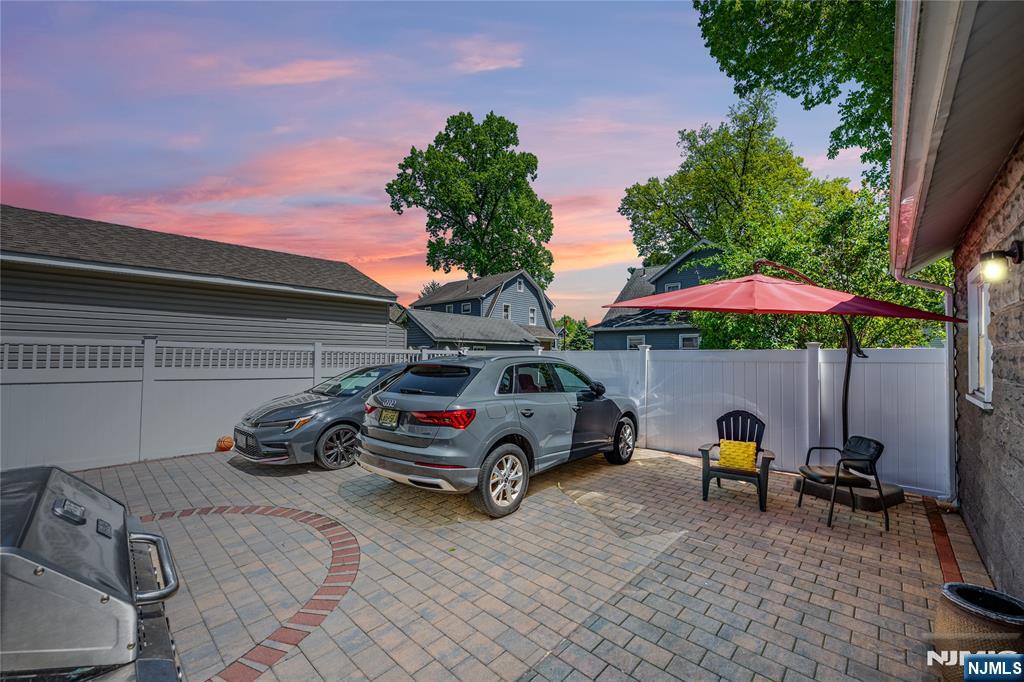 690 Garden Street Maywood, NJ 07607 - Photo 45 of 49 a car parked in front of a house