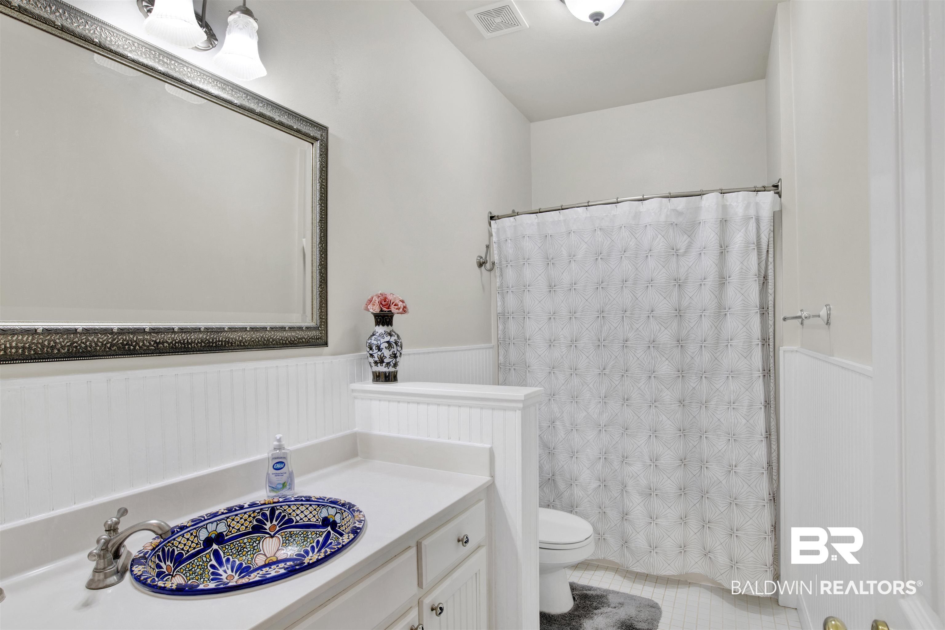 638 Southern Way Daphne, AL 36527 - Photo 20 of 26 Bathroom featuring vanity, toilet, and tile patterned floors