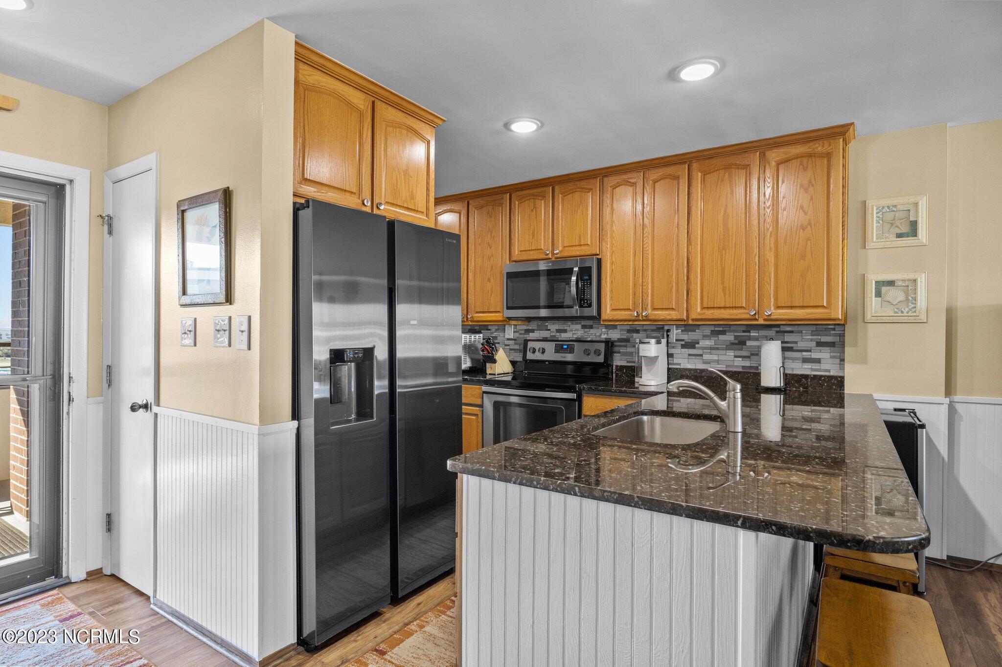1505 Salter Path Road, Unit 508A Indian Beach, NC 28512 - Photo 3 of 50 Entry & Kitchen v2