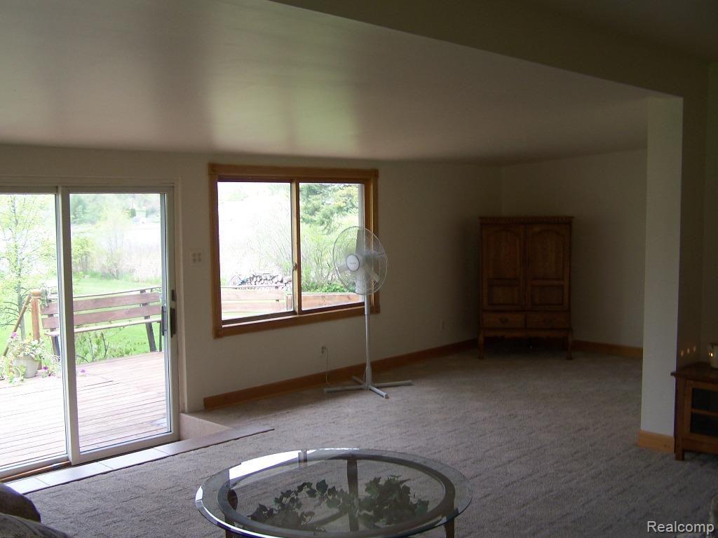 1945 Maxfield Lake Road Hartland, MI 48353 - Photo 6 of 16 Maxfield 1945 Living Room (1).jpg
