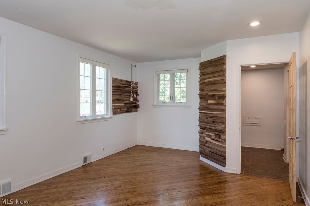 2547 Warwick Road Cleveland, OH 44120 - Photo 12 of 46 Unfurnished bedroom featuring dark wood-type flooring