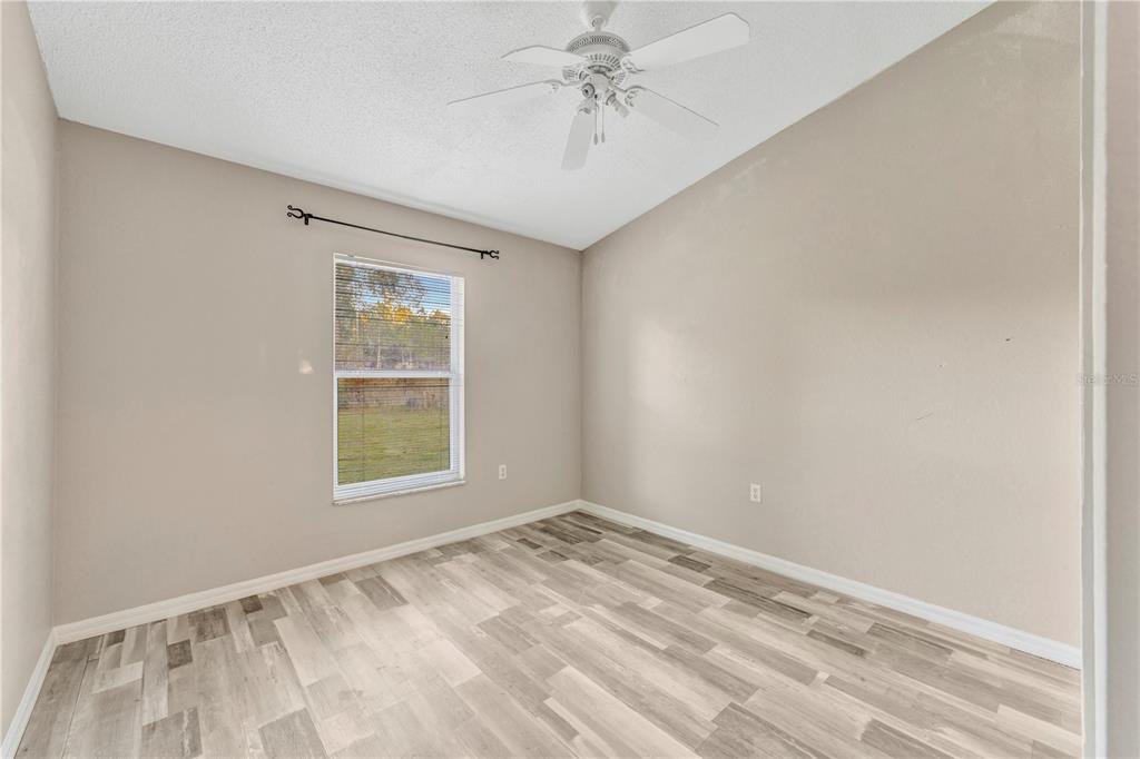 601 Parsons Reserve Court Seffner, FL 33584 - Photo 18 of 21 a view of an empty room with a window