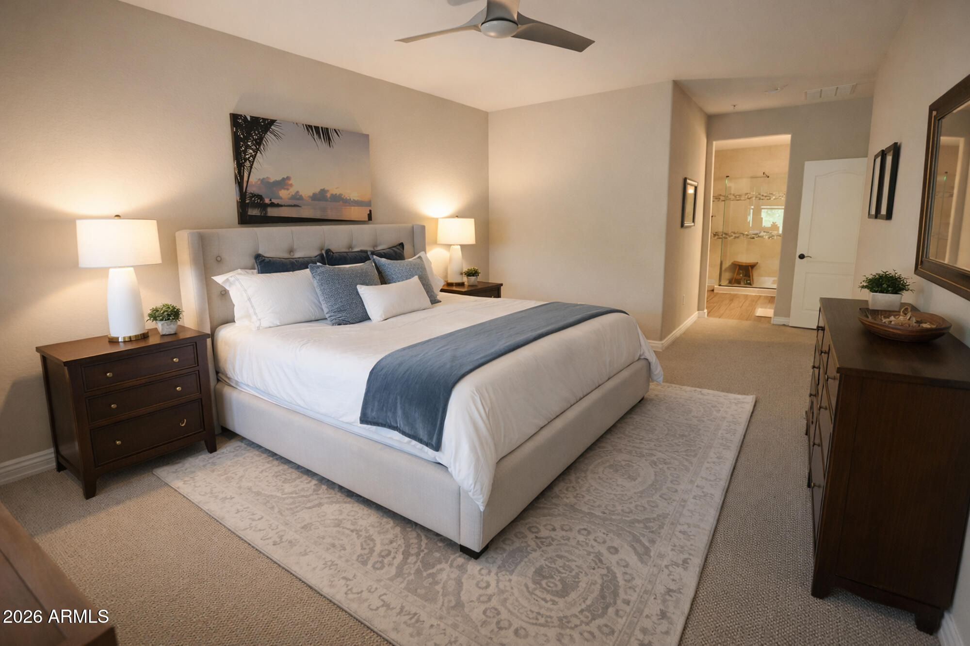 2425 West Bronco Butte Trail, Unit 2007 Phoenix, AZ 85085 - Photo 12 of 30 a bedroom with a bed and wooden floor