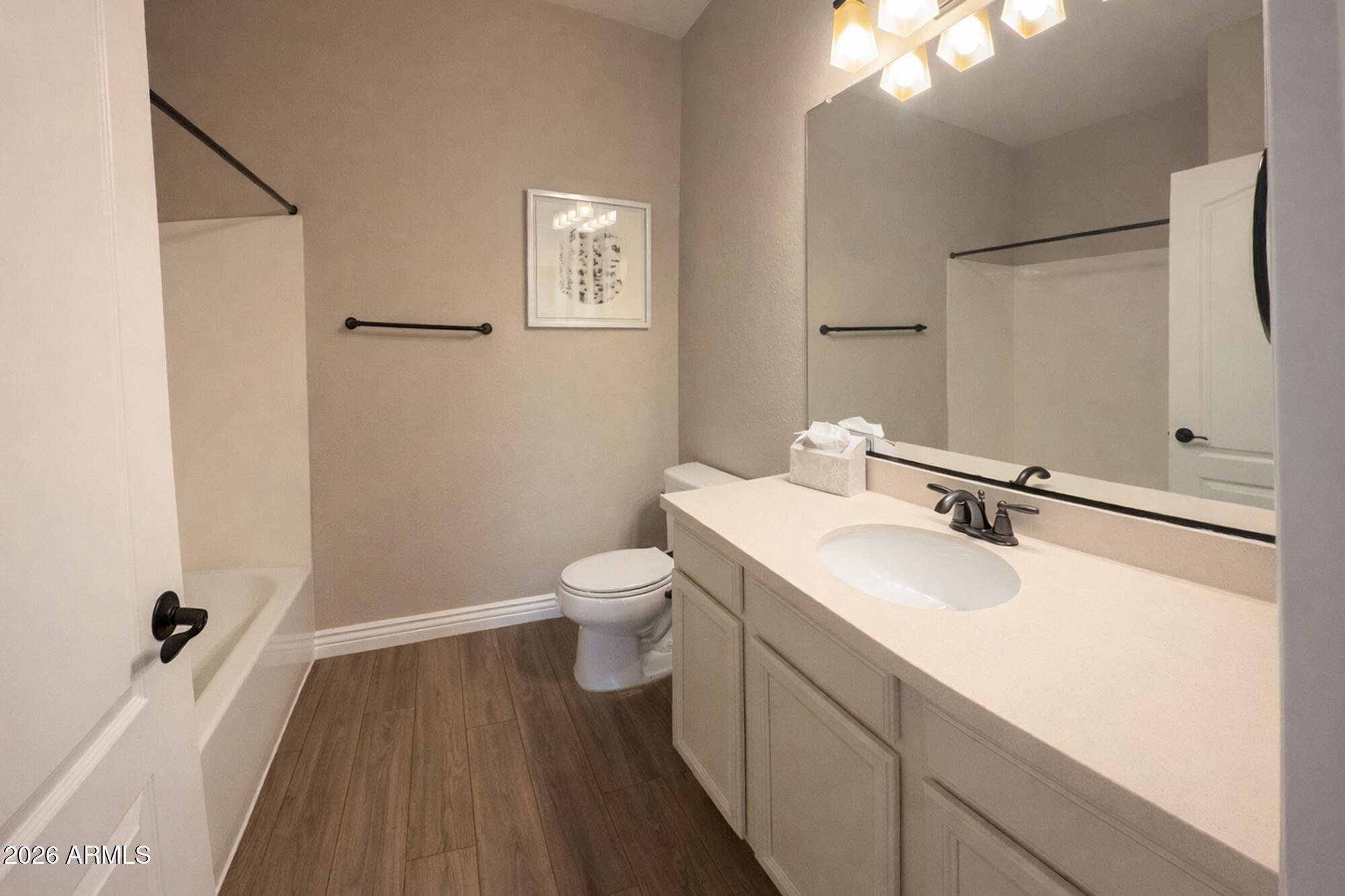 2425 West Bronco Butte Trail, Unit 2007 Phoenix, AZ 85085 - Photo 21 of 30 a bathroom with a sink and a mirror