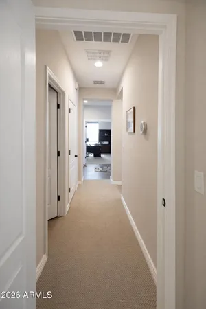 a view of hallway with livingroom