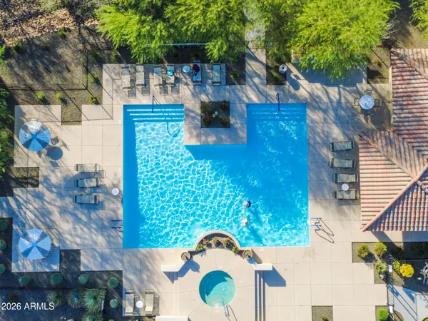 a backyard of a house with seating area