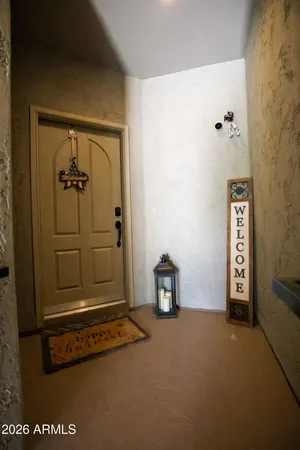 a view of a livingroom with entryway