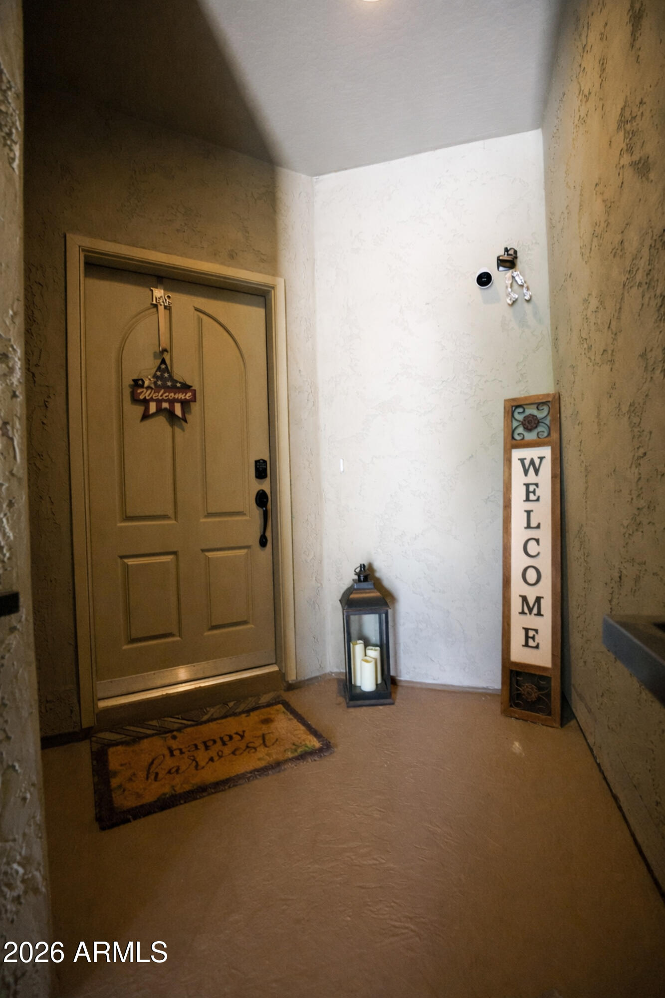 2425 West Bronco Butte Trail, Unit 2007 Phoenix, AZ 85085 - Photo 3 of 30 a view of a livingroom with entryway