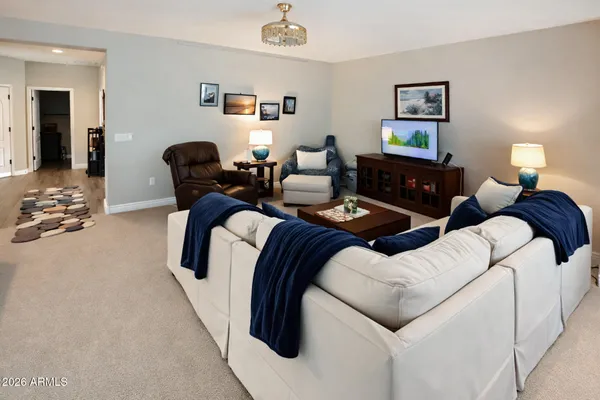 a living room with furniture and window