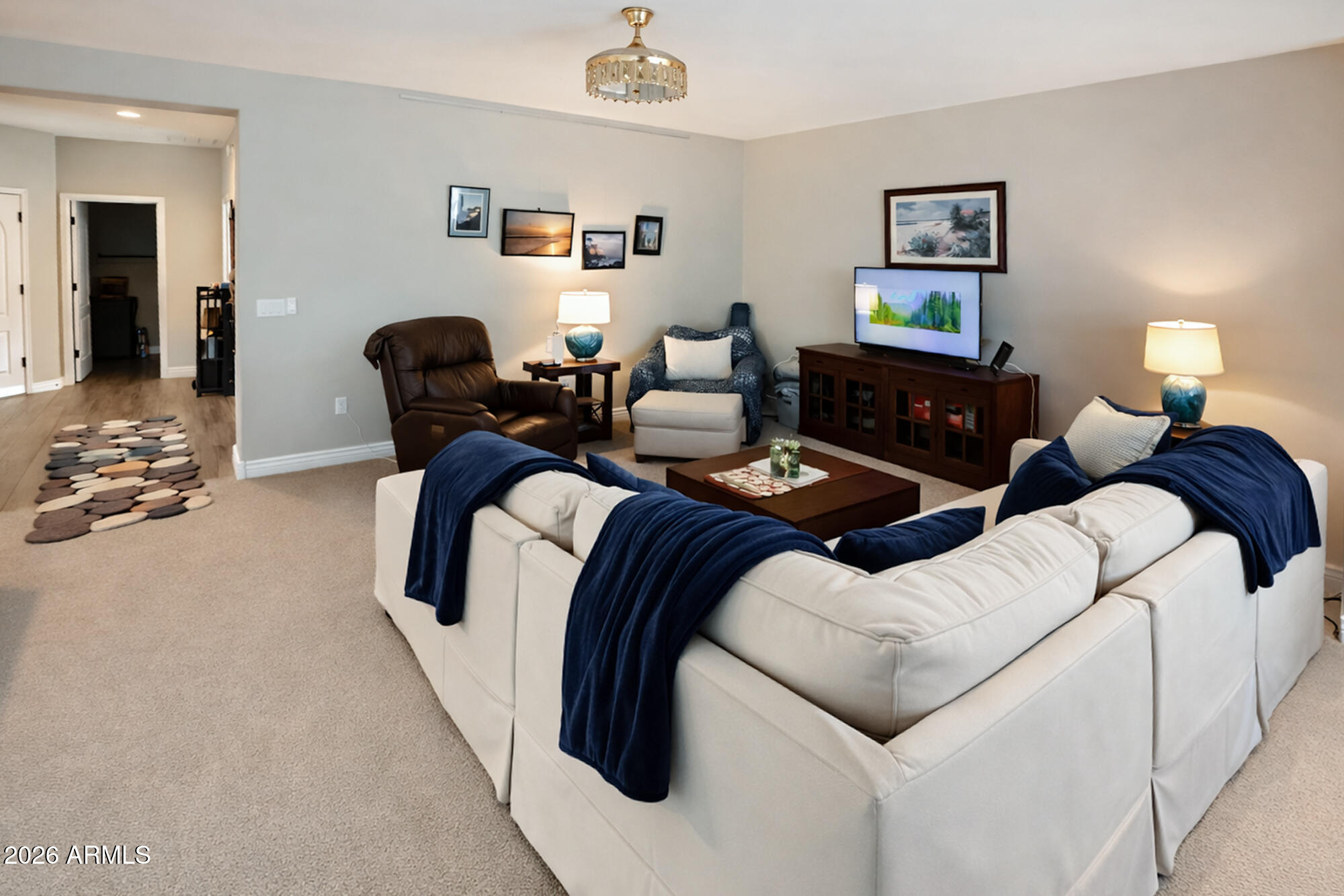 2425 West Bronco Butte Trail, Unit 2007 Phoenix, AZ 85085 - Photo 10 of 30 a living room with furniture and window