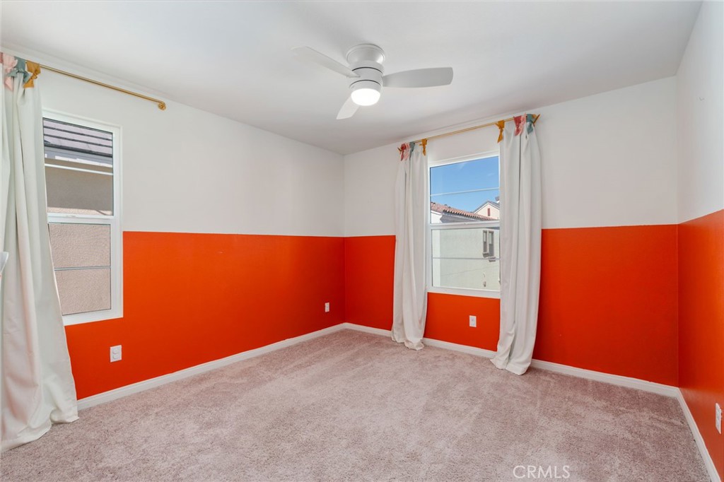13430 Limestone Drive Yucaipa, CA 92399 - Photo 25 of 30 an empty room with a workspace