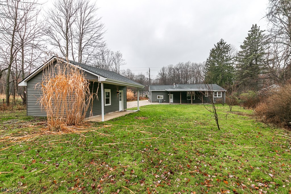 9865 Chillicothe Road Kirtland, OH 44094 - Photo 34 of 36 View of yard featuring a patio area