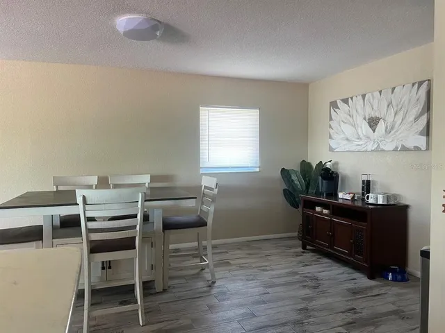a bathroom with a toilet and a bathtub