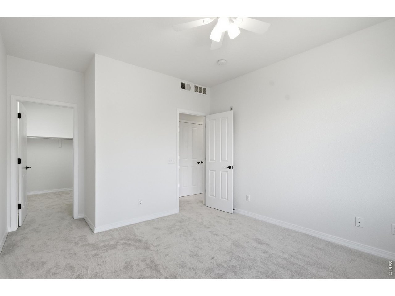 2133 Krisron Road, Unit 203 Fort Collins, CO 80525 - Photo 17 of 34 Primary Bedroom w/ Walk-In Closet