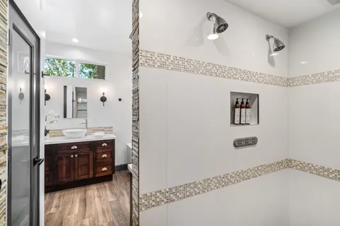 a bedroom with bed and a window