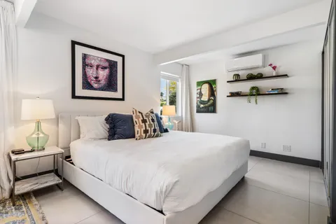 a view of a dinning table and chairs in patio of a house