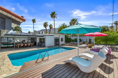a front view of a house with patio