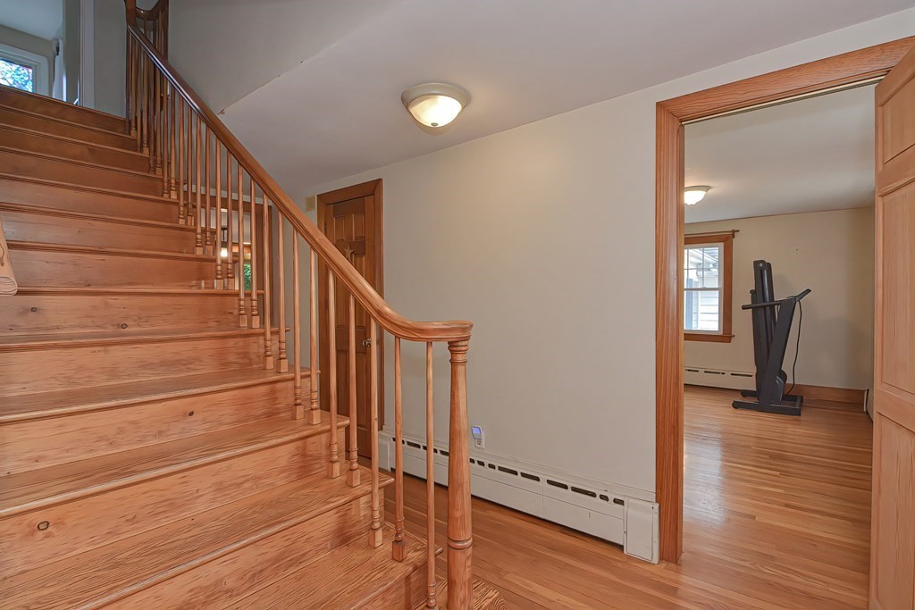 12 Ridgeview Road Sturbridge, MA 01566 - Photo 16 of 40 a view of entryway and hall with wooden floor