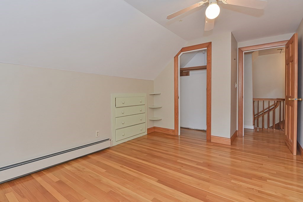 12 Ridgeview Road Sturbridge, MA 01566 - Photo 20 of 40 a view of an empty room with wooden floor