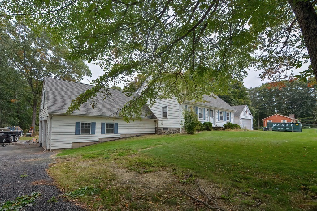 12 Ridgeview Road Sturbridge, MA 01566 - Photo 2 of 40 a house view with a garden space