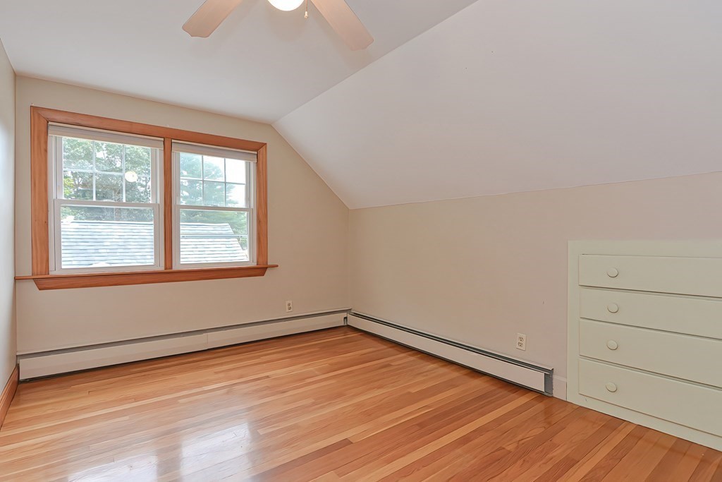 12 Ridgeview Road Sturbridge, MA 01566 - Photo 21 of 40 a view of empty room with wooden floor and fan