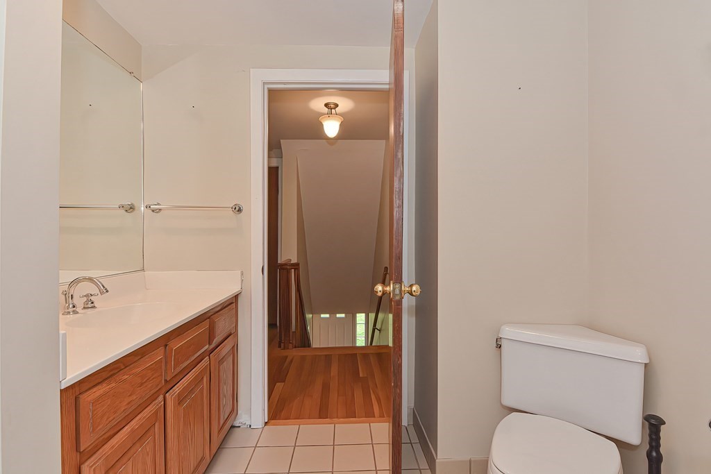 12 Ridgeview Road Sturbridge, MA 01566 - Photo 25 of 40 a bathroom with a sink a toilet and shower