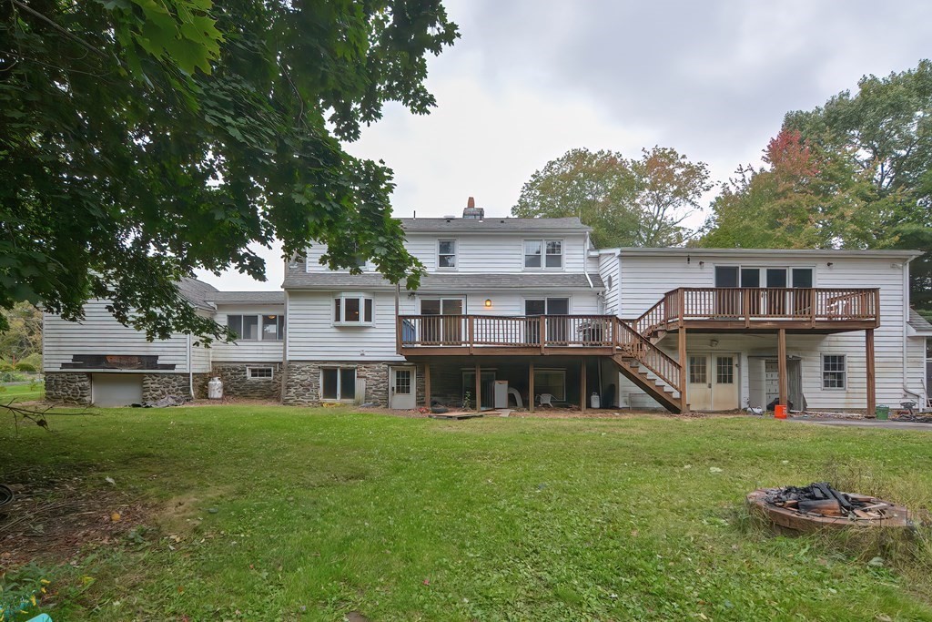 12 Ridgeview Road Sturbridge, MA 01566 - Photo 40 of 40 a front view of a house with a yard table and chairs