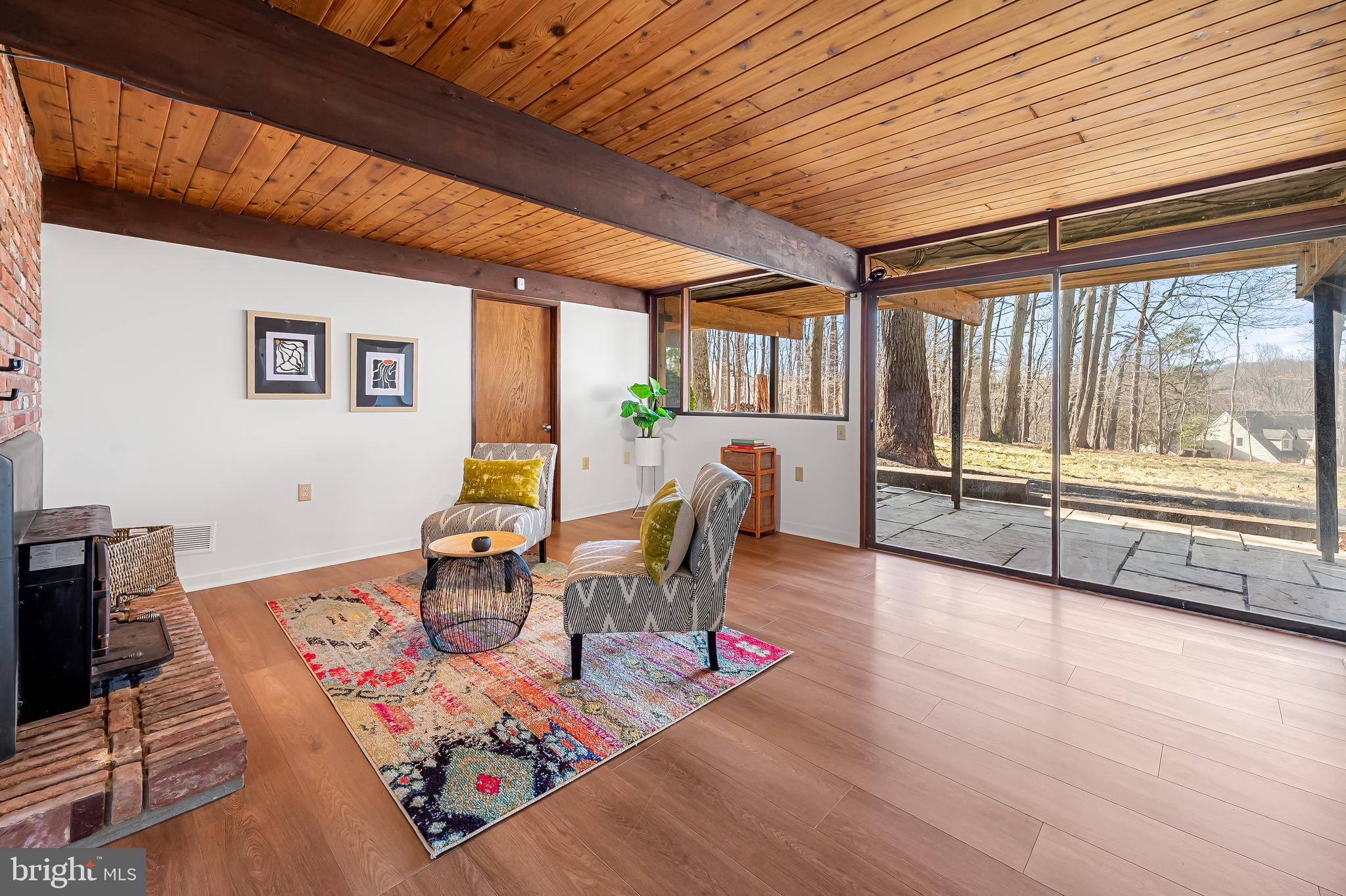 1817 Falls Road Parkton, MD 21120 - Photo 29 of 50 a living room with furniture and a floor to ceiling window