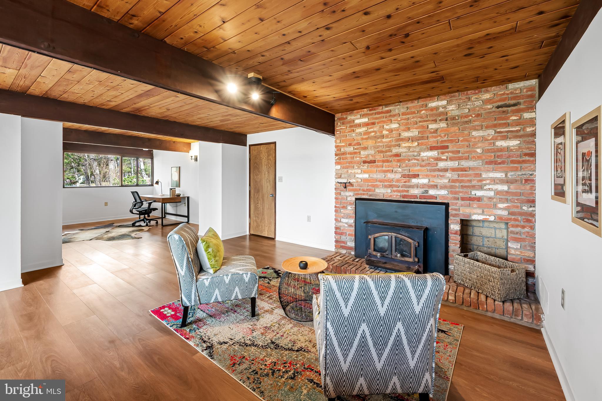 1817 Falls Road Parkton, MD 21120 - Photo 30 of 50 a living room with furniture large window and a fireplace
