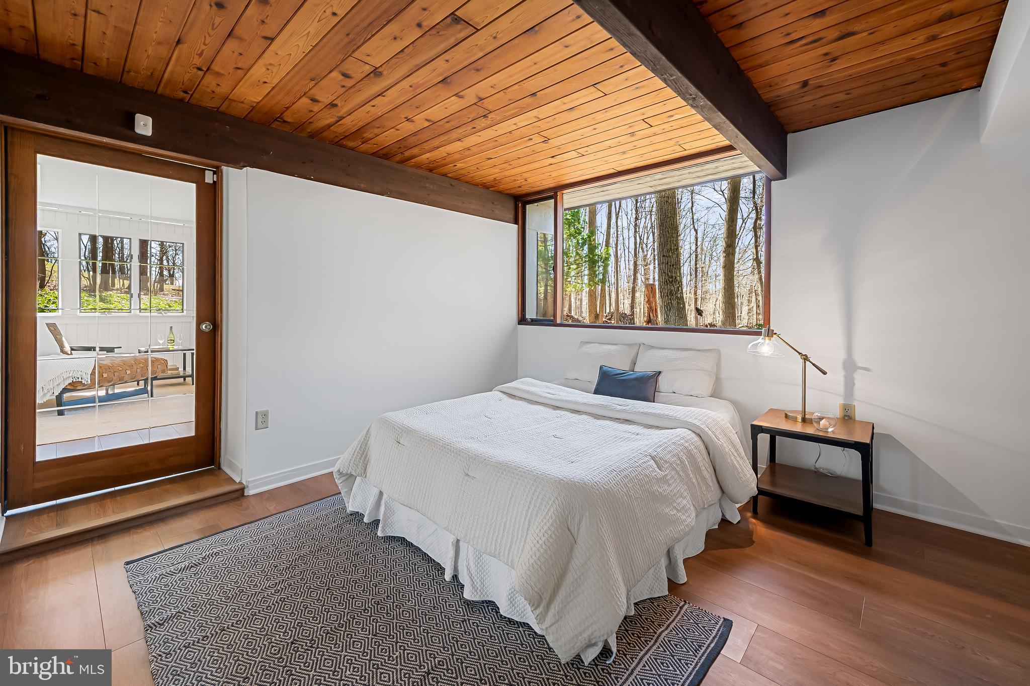 1817 Falls Road Parkton, MD 21120 - Photo 37 of 50 a spacious bedroom with a bed and a window