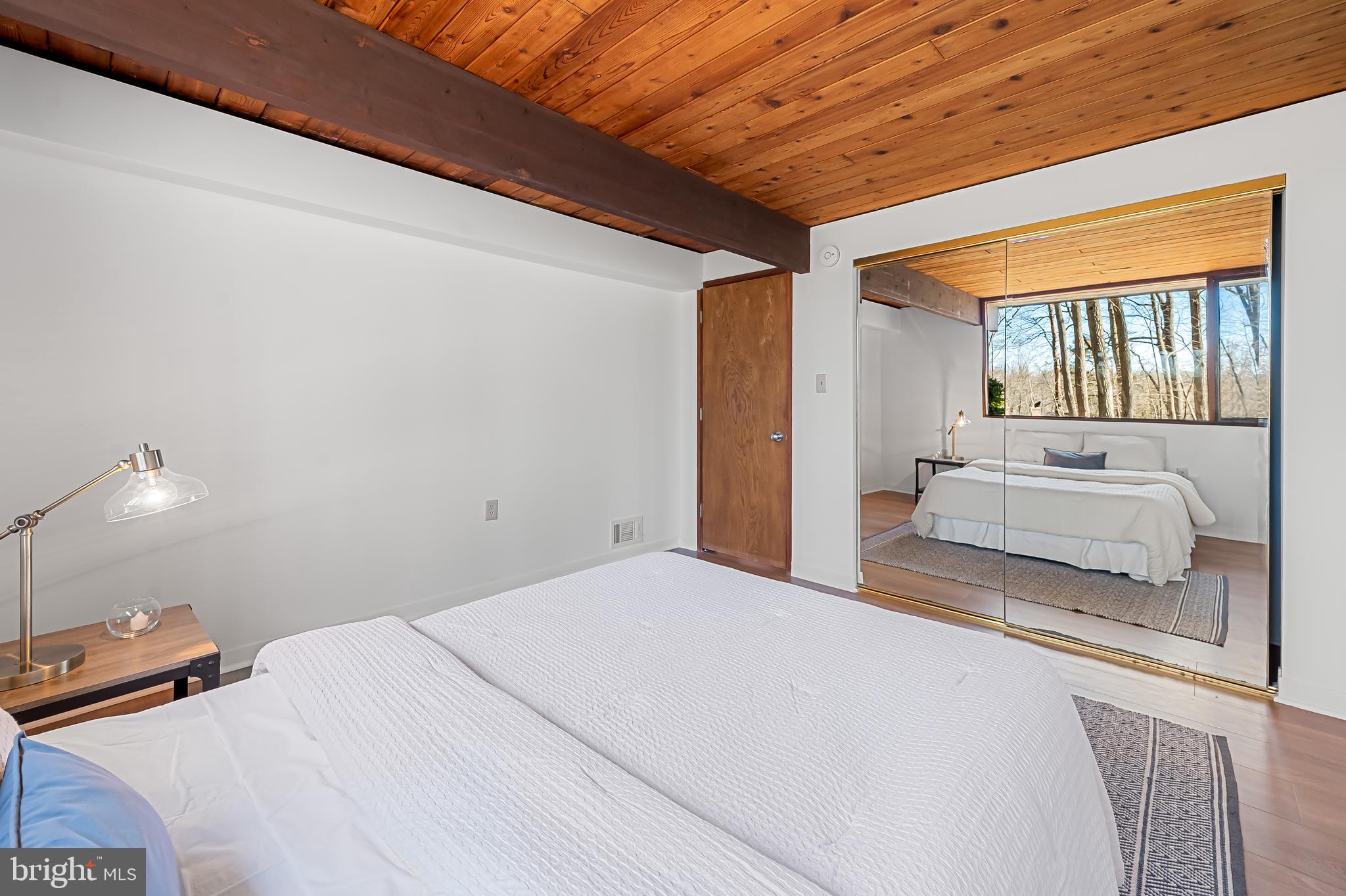 1817 Falls Road Parkton, MD 21120 - Photo 38 of 50 a spacious bedroom with a bed and a couch