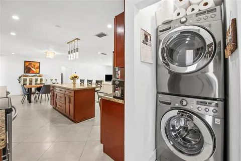 a view of living room with washer and dryer