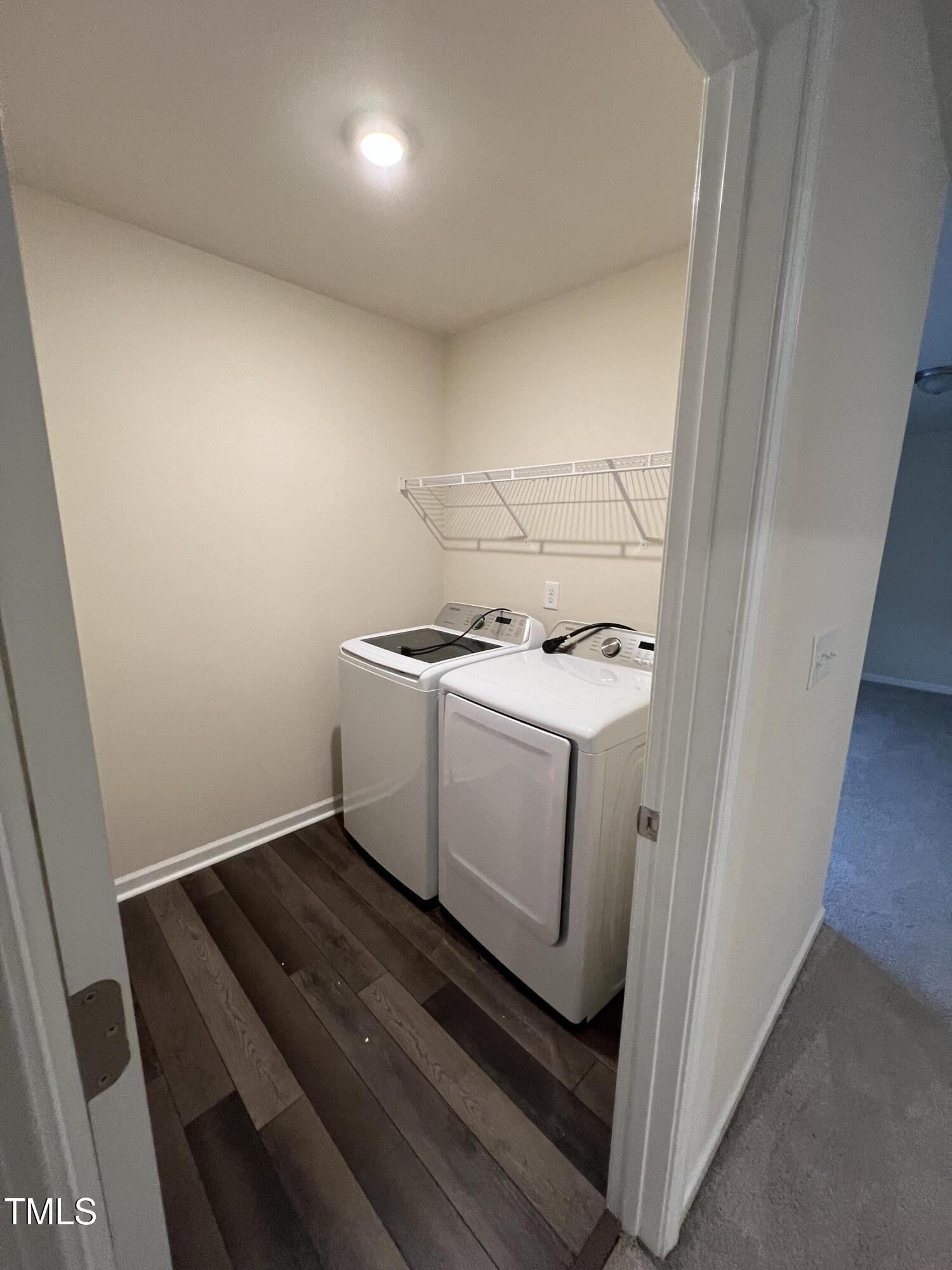 3529 Strawberry Patch Row Raleigh, NC 27604 - Photo 13 of 18 a utility room with dryer and washer