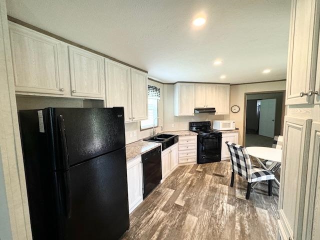 100 Rich Road Somerville, TN 38068 - Photo 11 of 20 a kitchen with granite countertop a refrigerator stove top oven and sink
