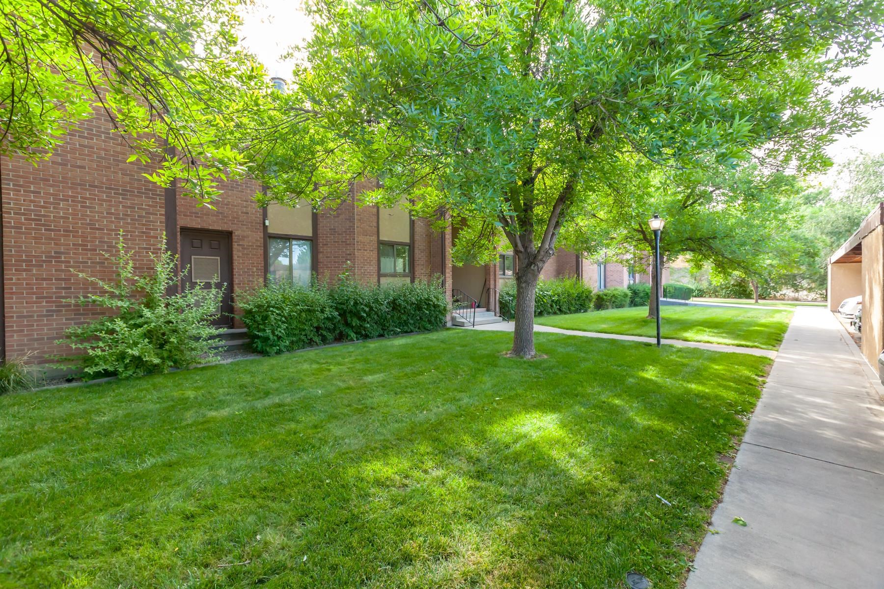 636 Horizon Drive, Unit 703 Grand Junction, CO 81506 - Photo 1 of 24 a view of a house with a backyard