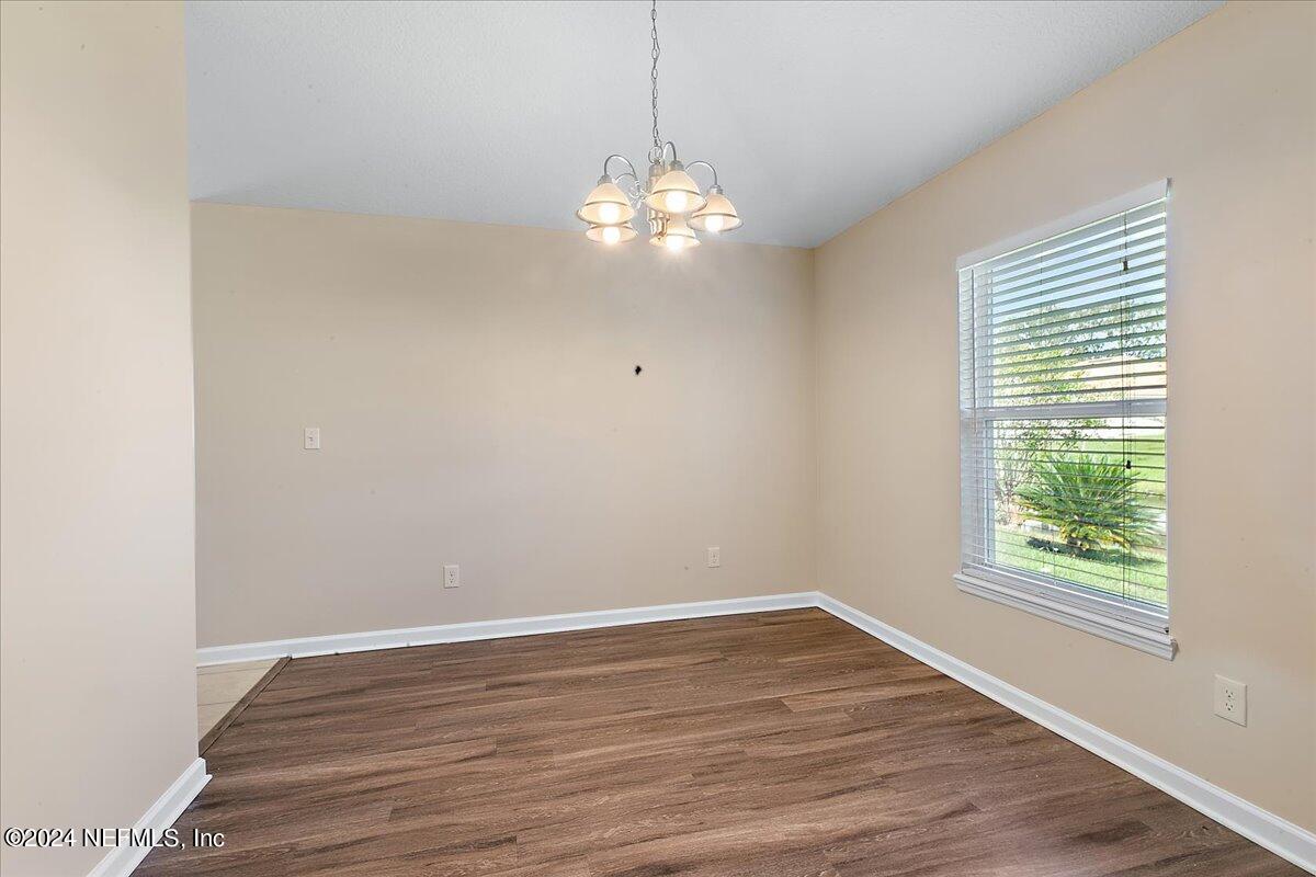 3022 Waters View Circle Orange Park, FL 32073 - Photo 9 of 17 a view of a chandelier in a room