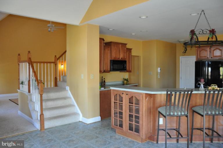 6970 Hawkins Gate Road La Plata, MD 20646 - Photo 8 of 11 stairway from kitchen area to upstairs