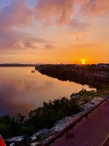 a view of a lake with mountain in the background